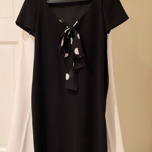 This dress is beautiful knee length crepe rich black fabric loose fit !